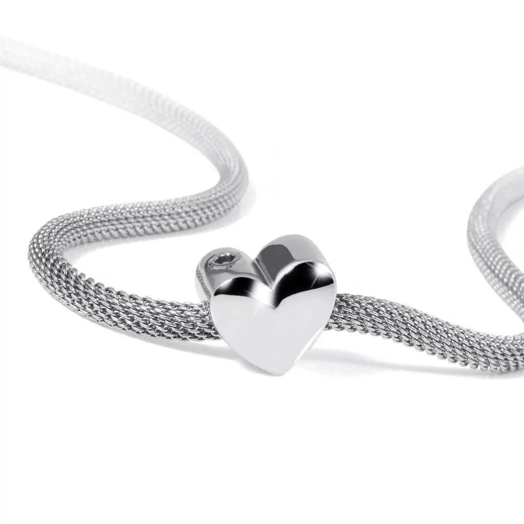 Silver ash charm - heart-shaped
