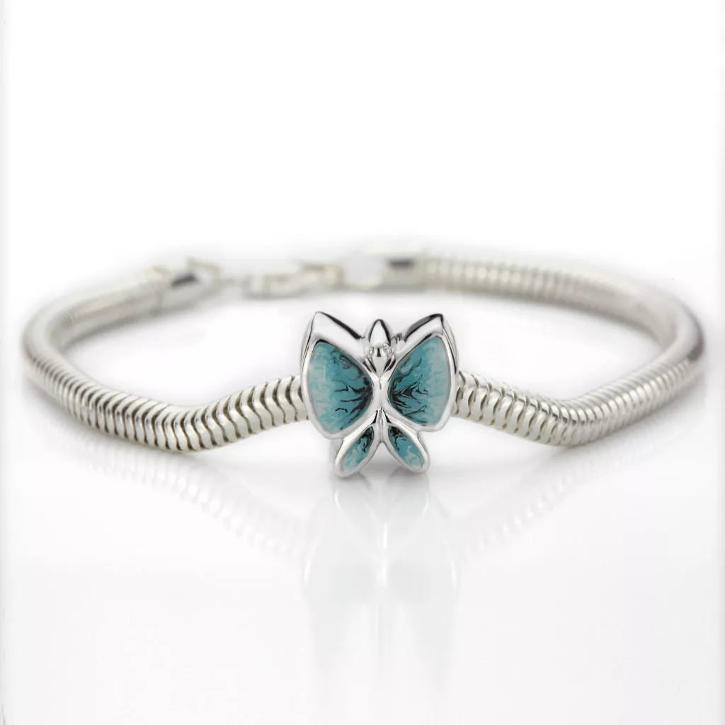 Silver ash charm - blue butterfly